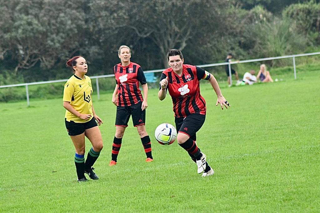 Keri Green, Redruth United club captain, playing in the club's red and black kit